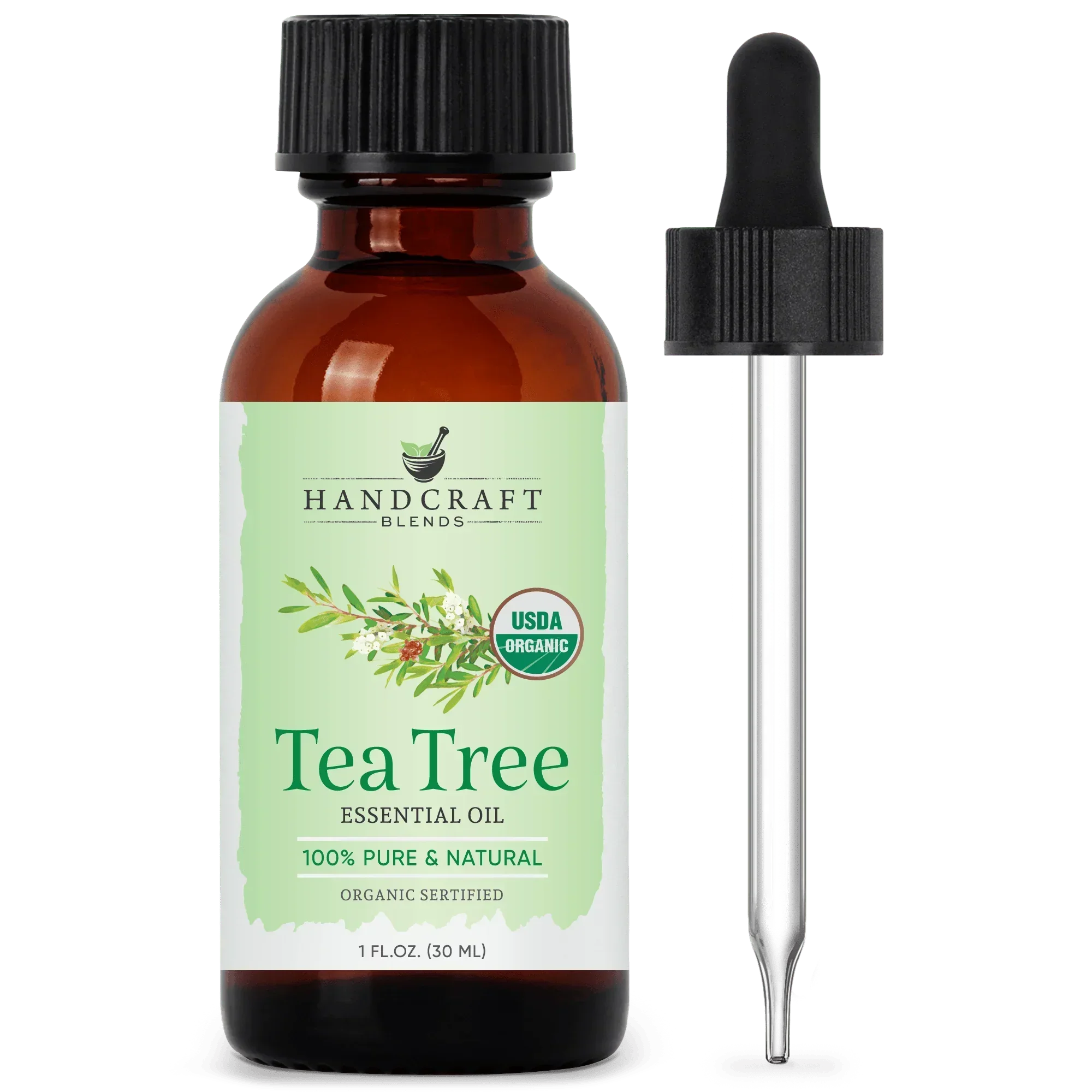 USDA organic tea tree essential oil bottle with dropper, 1oz, for aromatherapy.