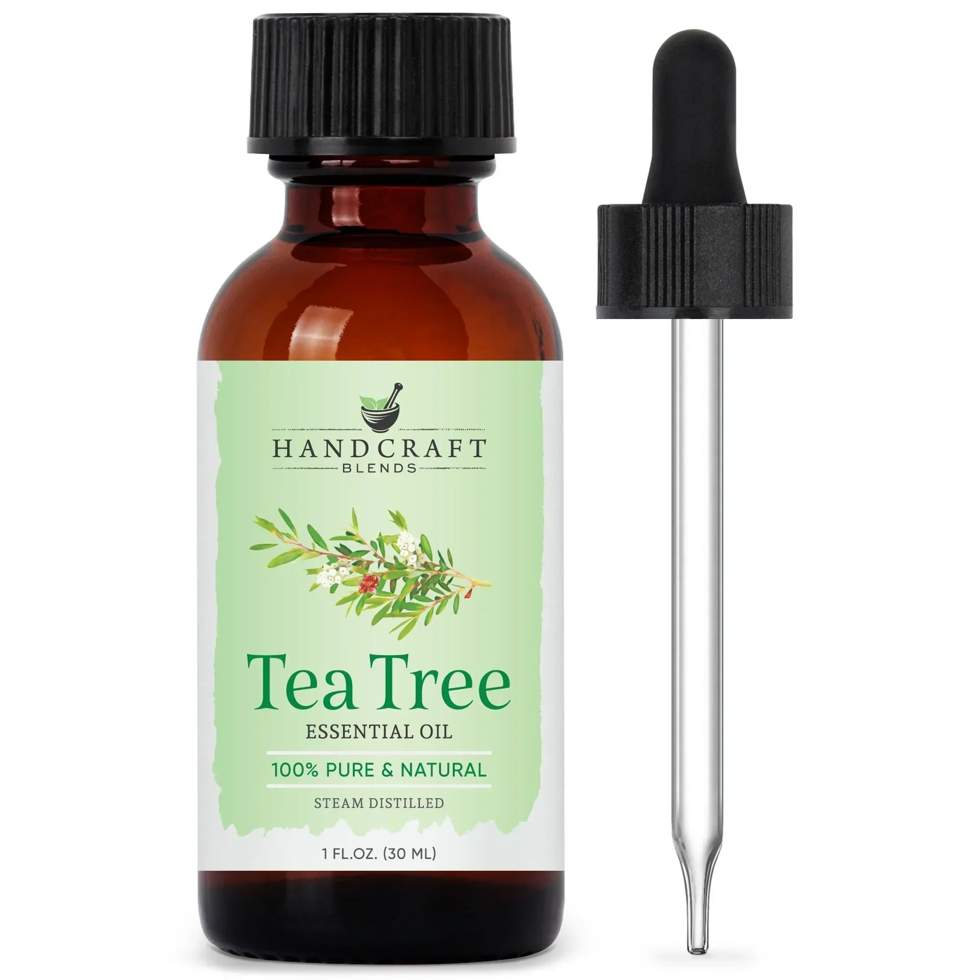 Amber bottle of tea tree essential oil with dropper, labeled 100% pure and natural.