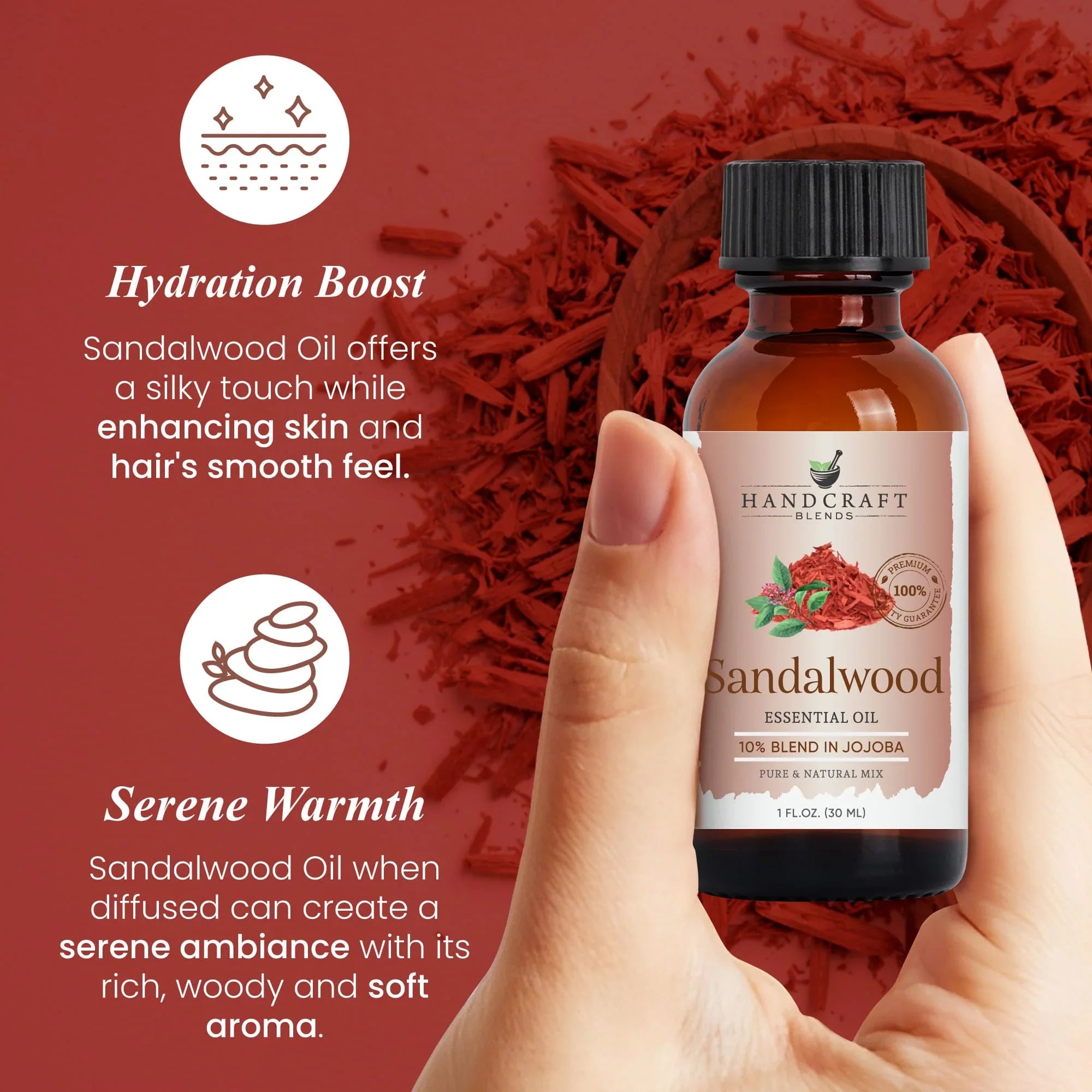 Hand holding a Sandalwood essential oil bottle with sandalwood pieces and benefits text on a red background