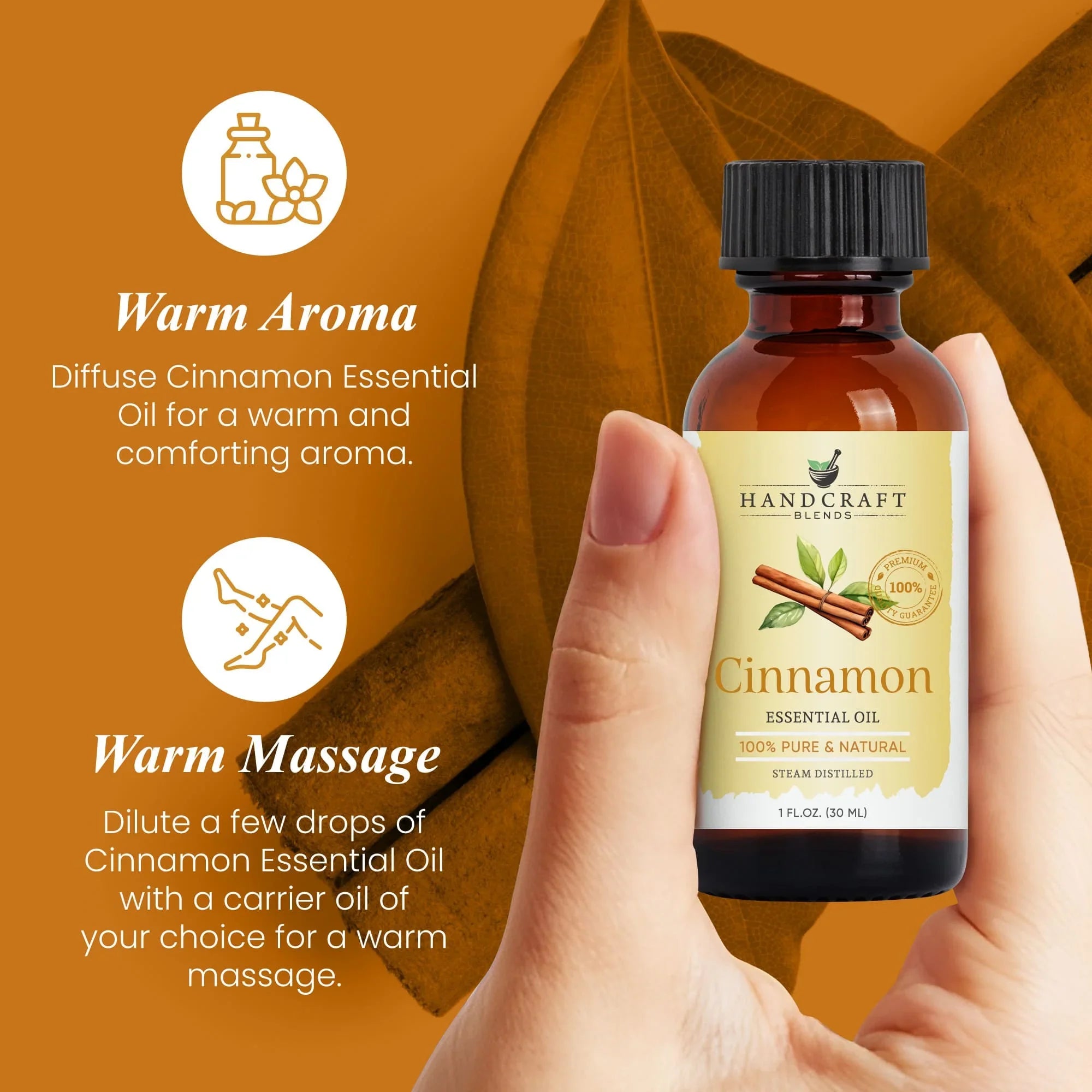 Hand holding cinnamon essential oil bottle for aromatherapy and massage on brown background.
