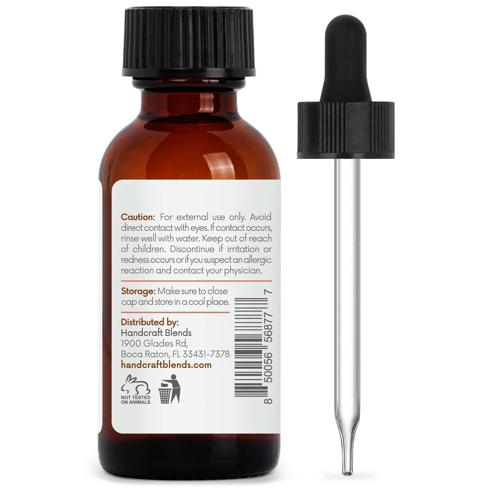 Amber essential oil bottle with dropper, caution label and barcode visible, aromatherapy supply