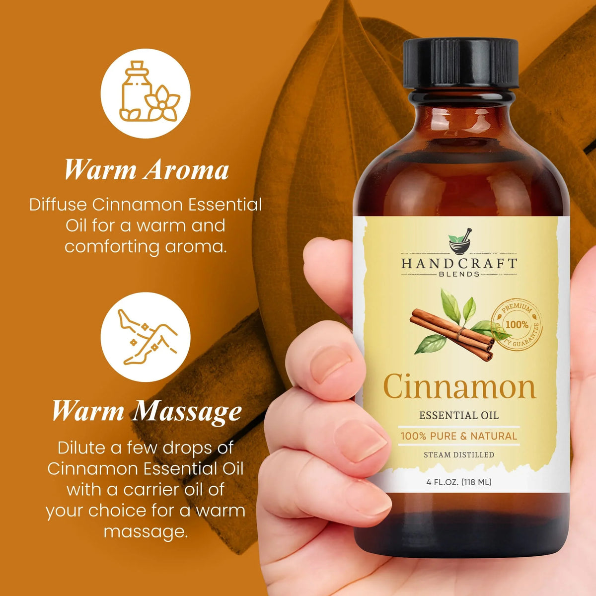 Hand holding a 4 oz bottle of cinnamon essential oil with text about aroma and massage benefits.