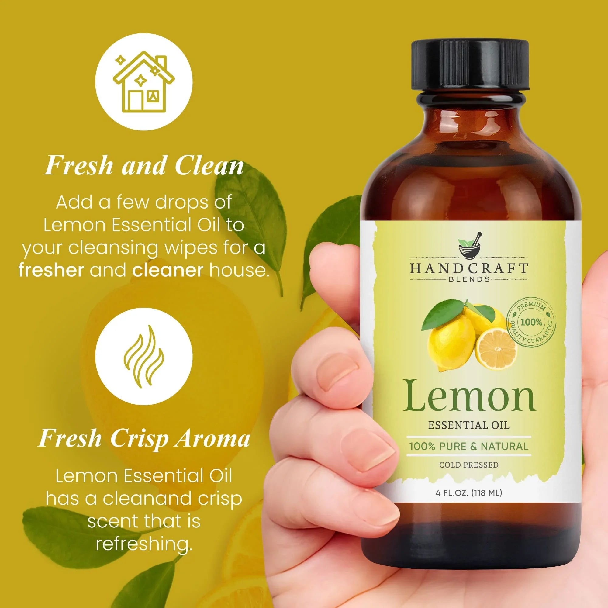 Hand holding 4oz lemon essential oil bottle, yellow background with lemon and leaves, text about fresh scent and cleaning benefits.