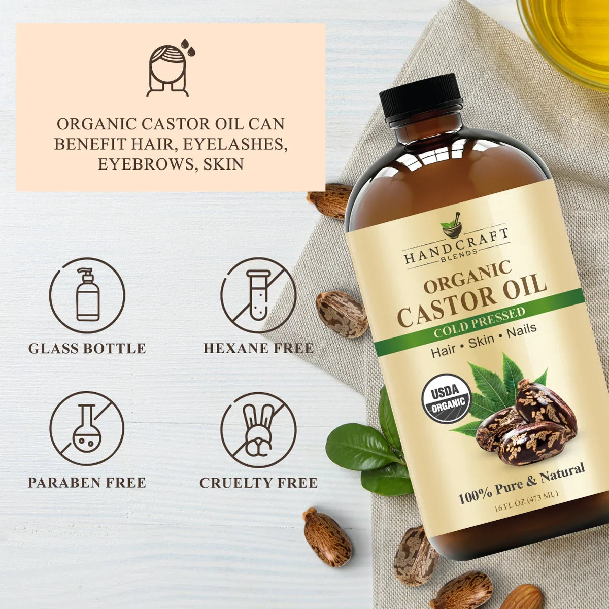 Organic castor oil bottle for hair, skin, and nails, with icons showing glass bottle, hexane free, paraben free, cruelty free.