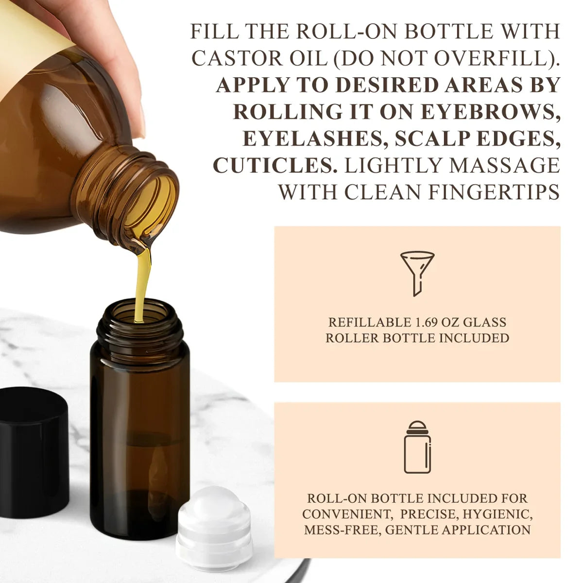 Brown bottle pouring castor oil into a refillable roll-on bottle on a marble surface