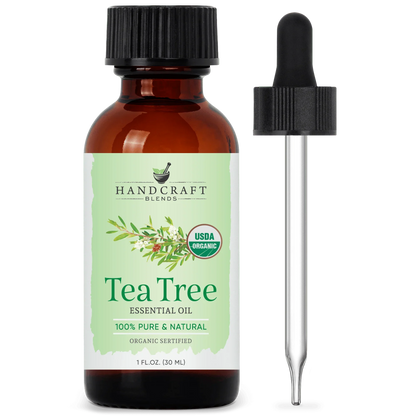 USDA organic tea tree essential oil bottle with dropper, 1oz, for aromatherapy.