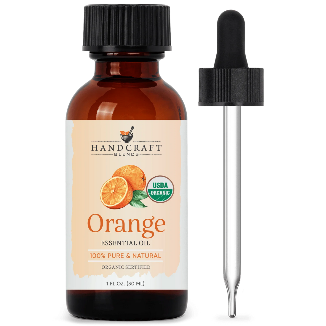 Amber bottle of organic orange essential oil with dropper, labeled pure and natural.