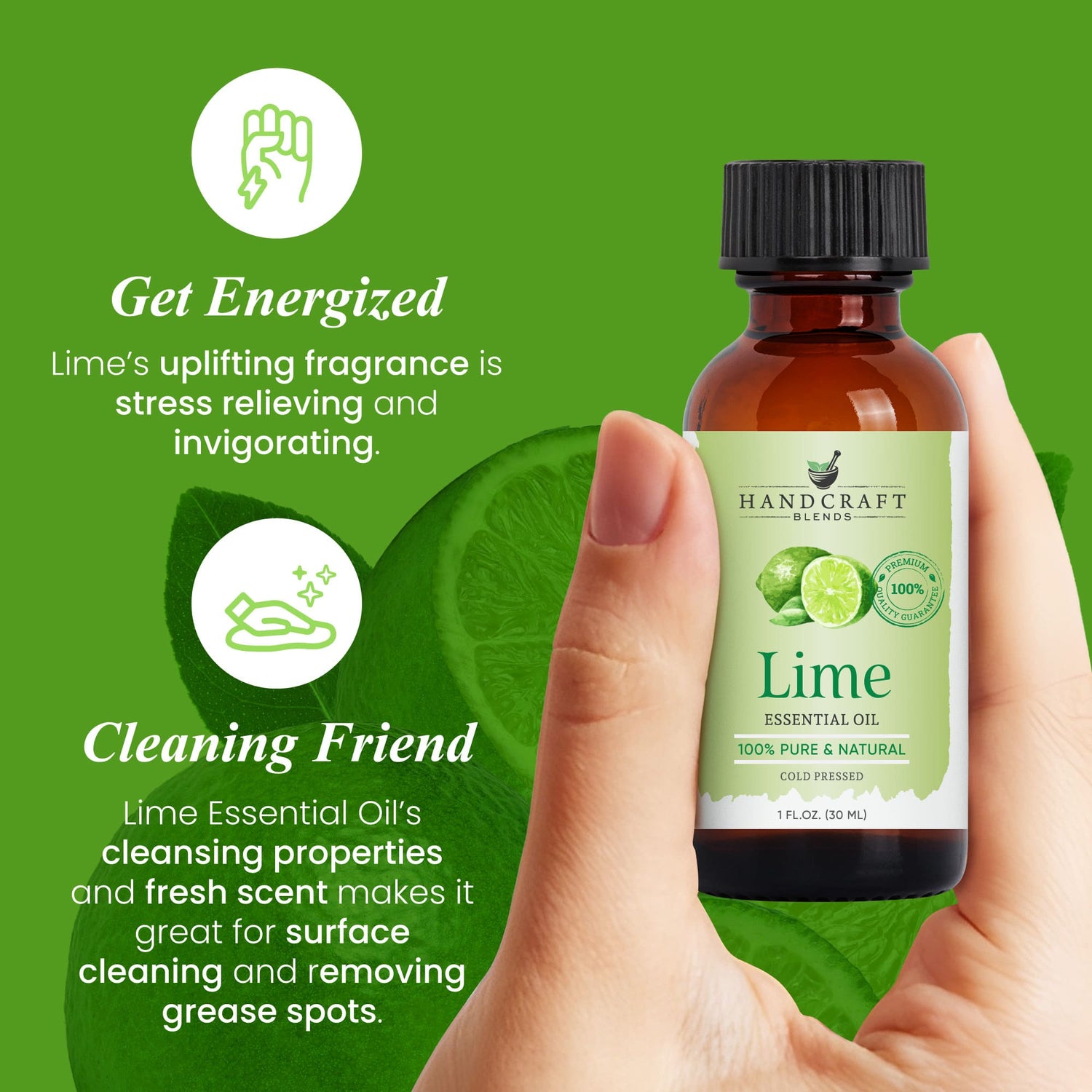Hand holding a bottle of lime essential oil with sliced lime and green background.