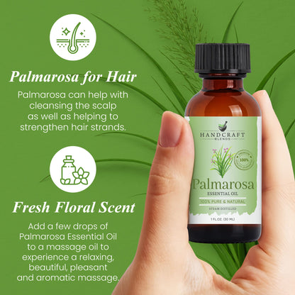 Hand holding Palmarosa essential oil bottle with text about hair and floral scent benefits, green background.