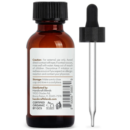 Amber glass essential oil bottle with safety instructions label and separate dropper