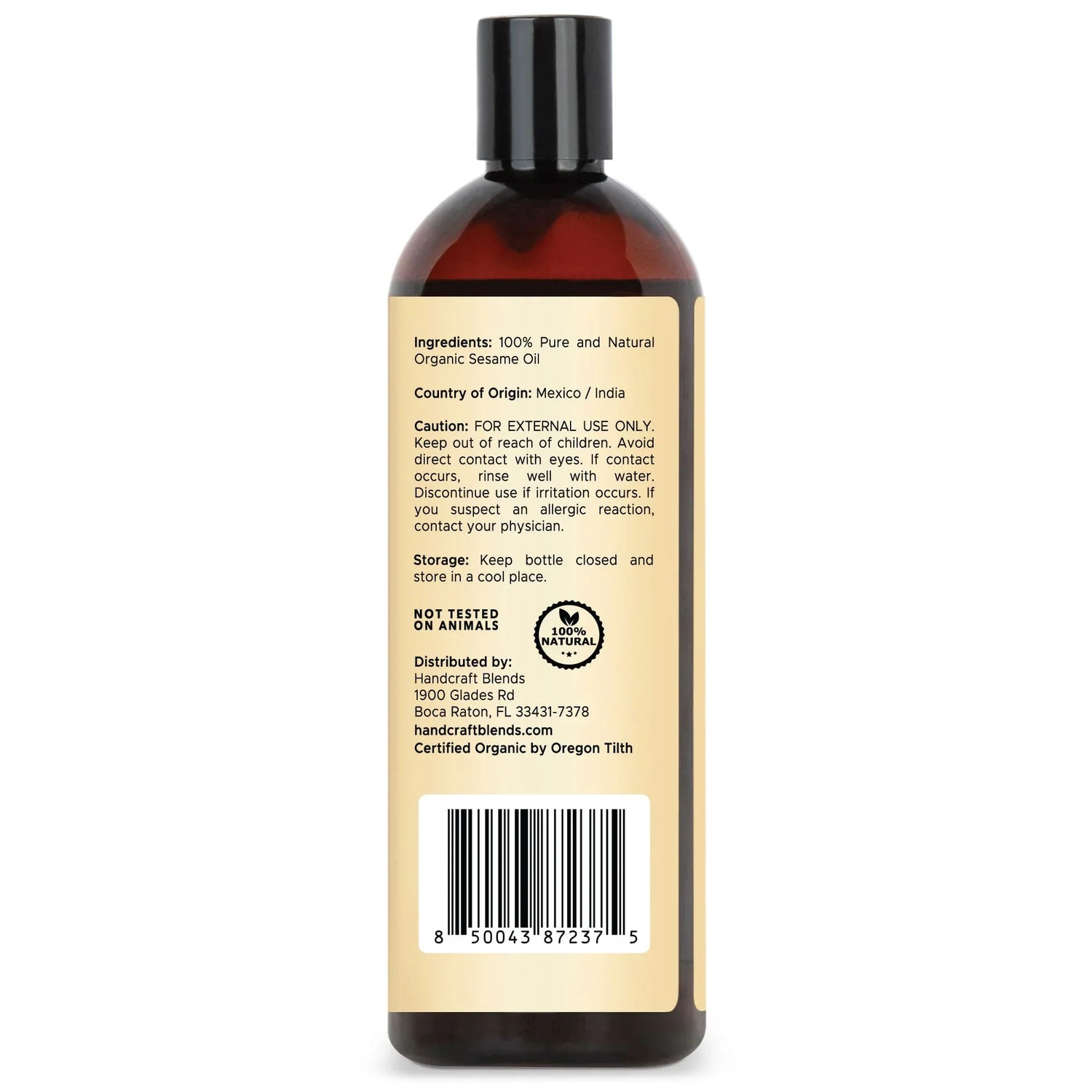Brown bottle of organic sesame oil with detailed ingredient and caution label, cruelty-free, 16oz