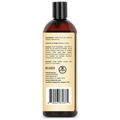 Brown bottle of organic sesame oil with detailed ingredient and caution label, cruelty-free, 16oz