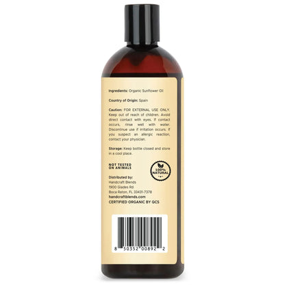 Back label of 16oz organic sunflower carrier oil bottle with ingredient and caution details.