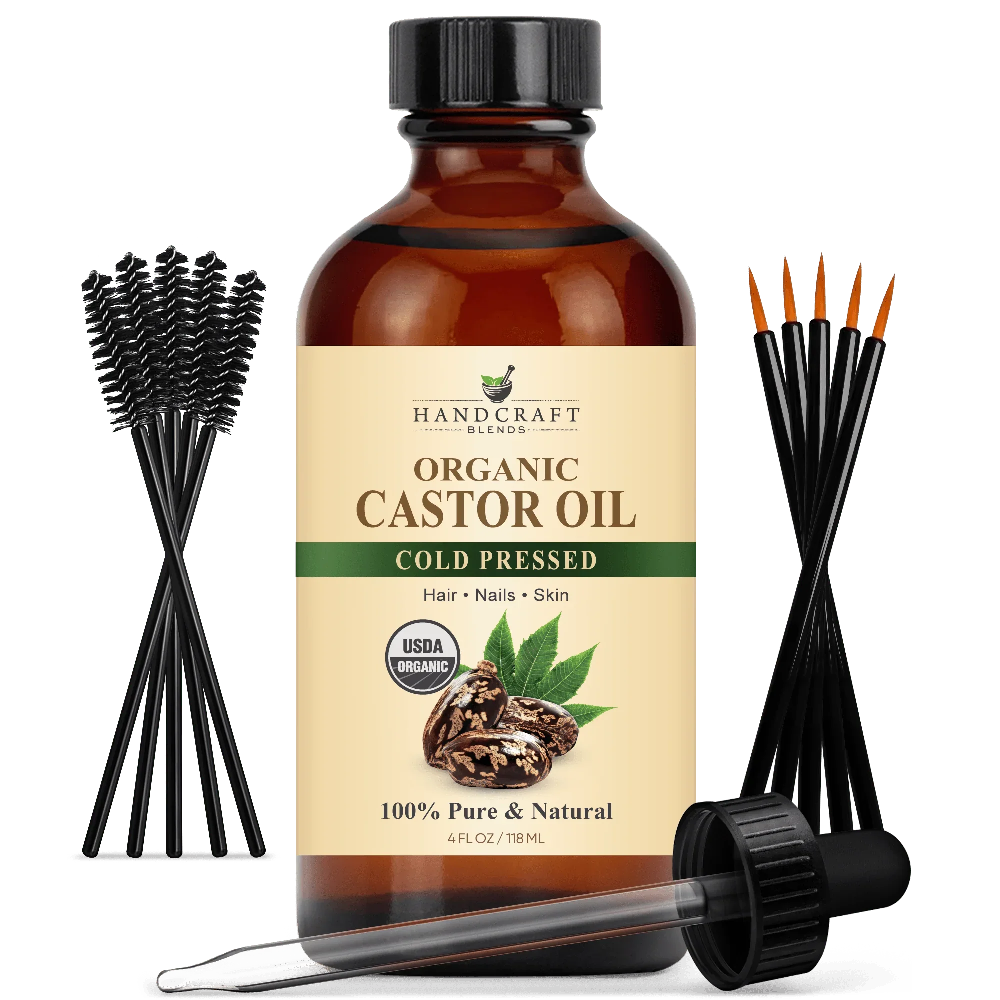 Organic castor oil bottle with dropper, spoolie brushes, and cold pressed label