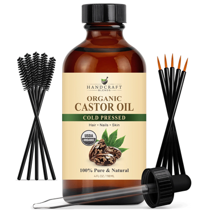 Organic castor oil bottle with dropper, spoolie brushes, and cold pressed label