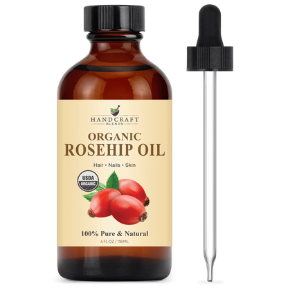 Amber glass bottle of organic rosehip oil with dropper, 4oz, for hair, nails, skin care.