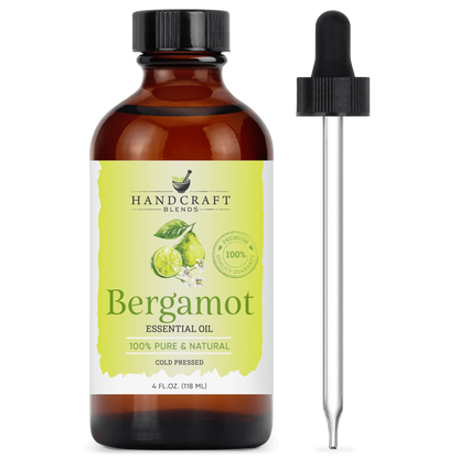 Amber bottle of bergamot essential oil with dropper, labeled 100% pure and natural.