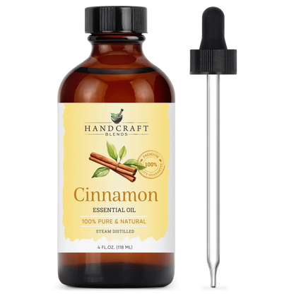 4oz amber bottle of cinnamon essential oil with dropper, labeled 100% pure and natural