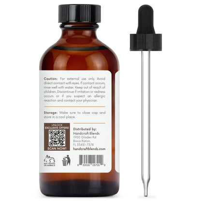 Amber glass essential oil bottle with dropper and product label showing caution, usage, and barcode.