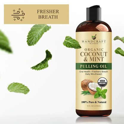 Organic coconut and mint pulling oil mouthwash bottle with mint leaves and fresher breath label