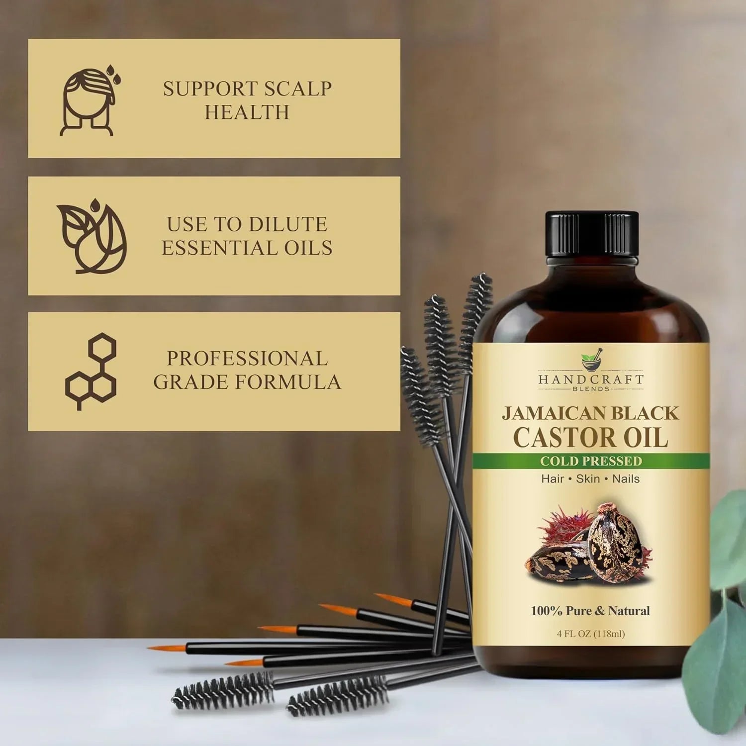 Jamaican black castor oil bottle with mascara brushes, promoting scalp health, essential oil dilution, and professional grade formula.