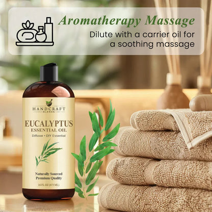 Eucalyptus essential oil bottle with spa towels and massage accessories for aromatherapy.
